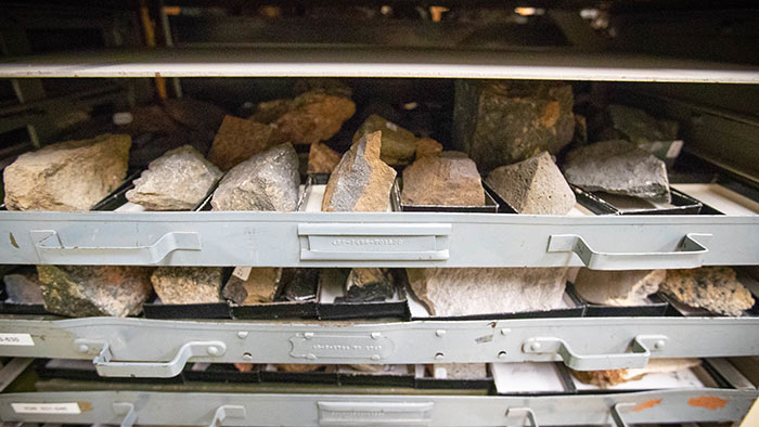 Stacked drawers full of samples of rocks and minerals for students to use to study.